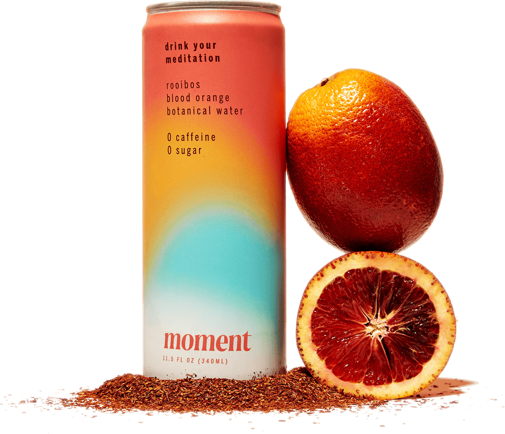 moment drink can with fresh oranges